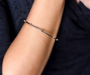 183.26 - BRACELETE DE AÇO ESFERAS