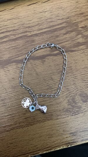 197.23 - PULSEIRA DE AÇO OLHO GREGO COM TREVO