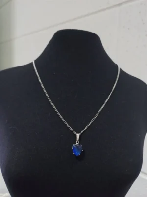 229.61 - COLAR DE AÇO COM PINGENTE CORAÇÃO COLORIDO