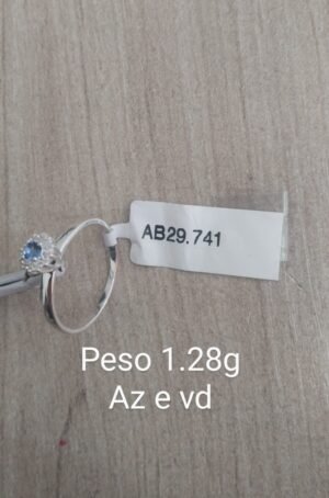 333.46 - ANEL DE PRATA SOLITARIO PONTO DE LUZ AZUL COM CRAVEJADO CONTORNO