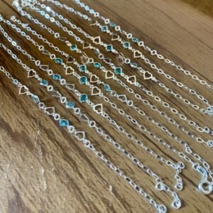 140.160 - PULSEIRA DE PRATA CORAÇÕES VAZADOS COM PONTOS DE LUZ