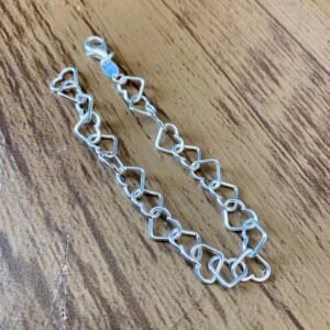 140.161 - PULSEIRA DE PRATA ELOS CORAÇÕES VAZADOS 5.4G