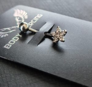 11.46 - PIERCING DE AÇO FLOR UMBIGO (PINGENTE FOLHEADO)