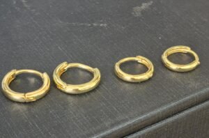 142.12 - BRINCO BANHADO A OURO 3MLS + C.A - ARGOLA LISA BOLEADA