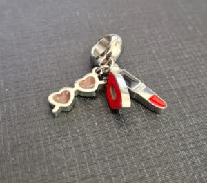 179.221 - BERLOQUE DE AÇO BATOM E ÓCULOS