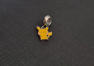 180.191 - BERLOQUE DE AÇO PIKACHU